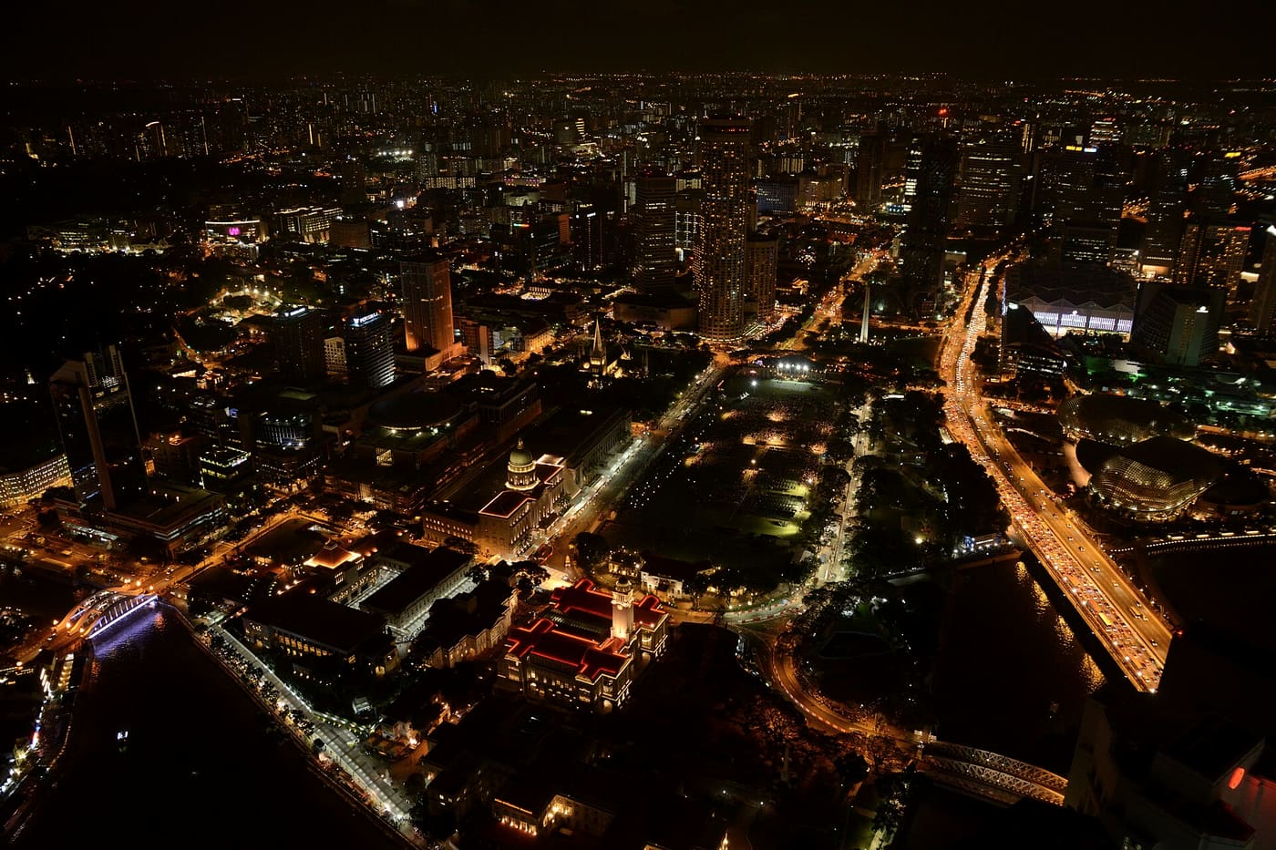 Singapore's Civic District and city lights at night from above
